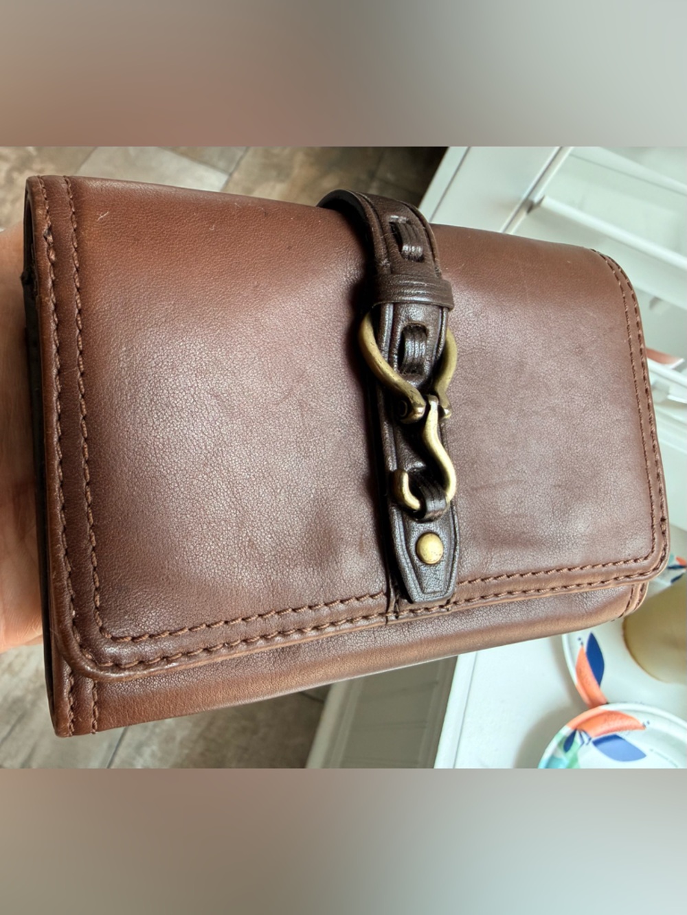 Cole Haan Accordian leather wallet with snap closure equestrian style hardware